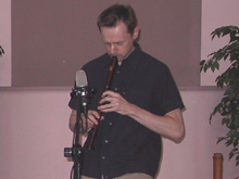 Cornell Kinderknecht playing recorder at Malvina's Coffeehouse, Carrollton, Texas